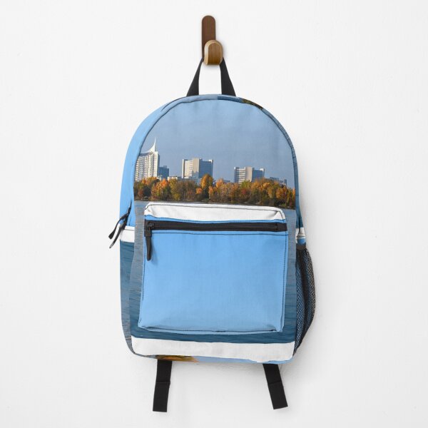 Item preview, Skyline of Vienna and blue Donau river, autumn season designed and sold by goceris.