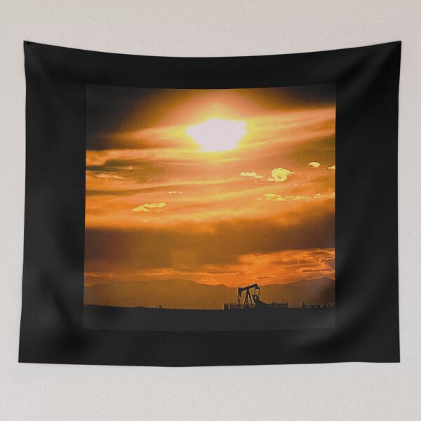 Item preview, Golden Clouds Embrace Sunlit Pump Jack at Dusk designed and sold by IFLYBaby.