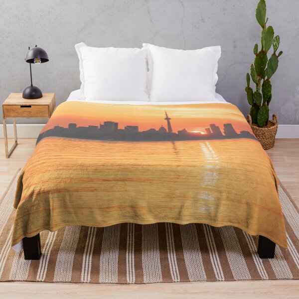 Item preview, The Wait is Over - Split Sunrise Behind Toronto Skyline designed and sold by Georgia Mizuleva.