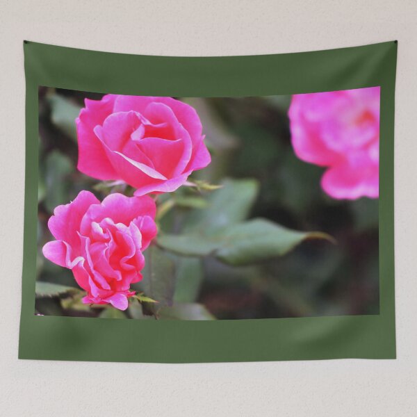 Item preview, Pink fluorescent bright colorful roses against blurred leaf green background designed and sold by Jacobs-Media.