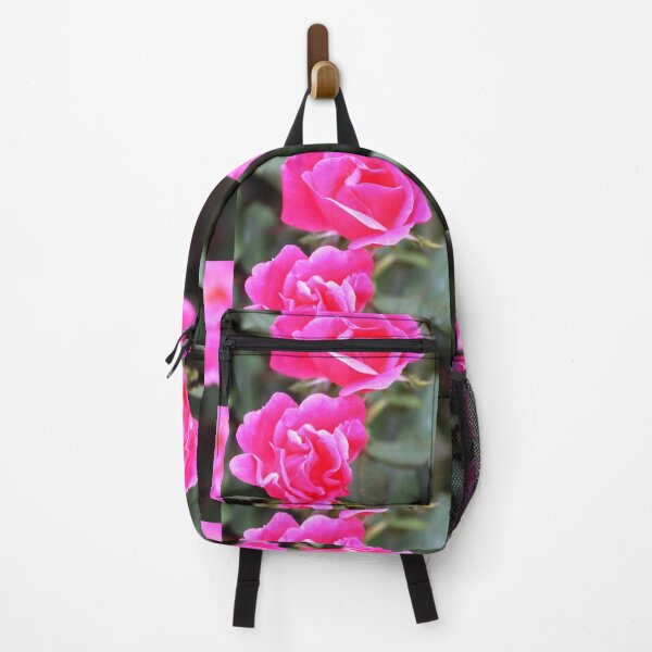 Item preview, Pink fluorescent bright colorful roses against blurred leaf green background designed and sold by Jacobs-Media.