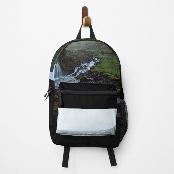 Item preview, Majestic Waterfall in Iceland Landscape with Green Hills designed and sold by regnumsaturni.