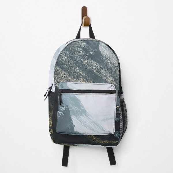 Item preview, A lone hiker exploring a rugged mountain valley shrouded in mist on a quiet winter morning. designed and sold by Jerhus.