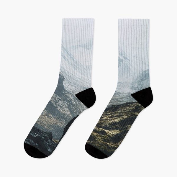 Item preview, A lone hiker exploring a rugged mountain valley shrouded in mist on a quiet winter morning. designed and sold by Jerhus.