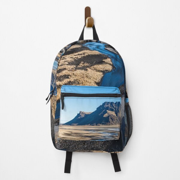 Item preview, A serene river meanders through the golden landscape under a clear blue sky near a majestic mountain in Iceland during the day. designed and sold by Jerhus.