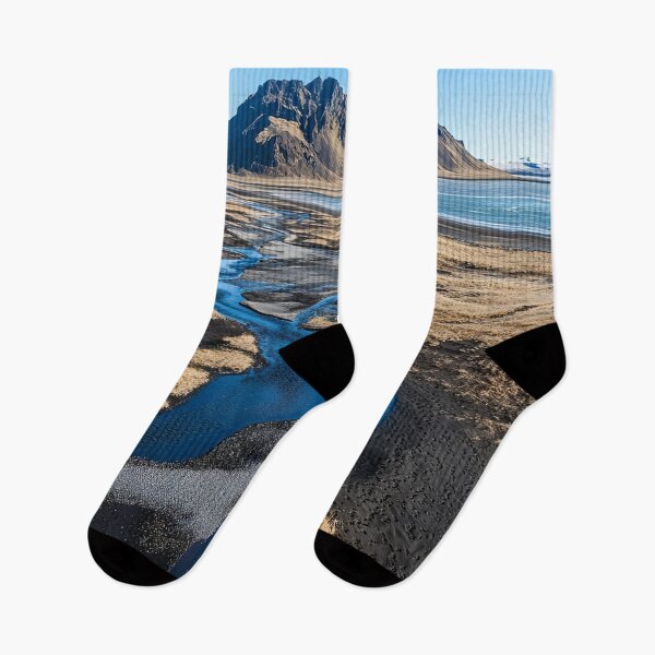 Item preview, A serene river meanders through the golden landscape under a clear blue sky near a majestic mountain in Iceland during the day. designed and sold by Jerhus.