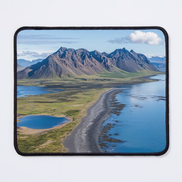 Item preview, Aerial view of a rugged coastline with mountains and calm waters on a sunny day in a remote wilderness area. designed and sold by Jerhus.