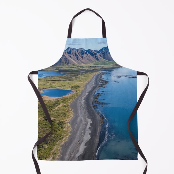Item preview, Aerial view of a rugged coastline with mountains and calm waters on a sunny day in a remote wilderness area. designed and sold by Jerhus.