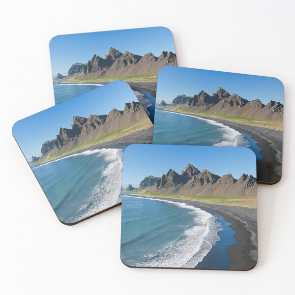 Item preview, Spectacular coastline with black sand beaches and dramatic mountains in Iceland under clear blue skies. designed and sold by Jerhus.