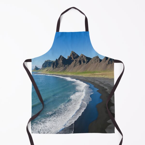 Item preview, Spectacular coastline with black sand beaches and dramatic mountains in Iceland under clear blue skies. designed and sold by Jerhus.