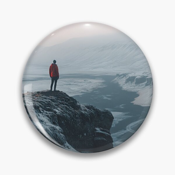 Item preview, A person stands on a snowy cliff overlooking a winding river in a remote and rugged landscape on a morning in Iceland. designed and sold by Jerhus.