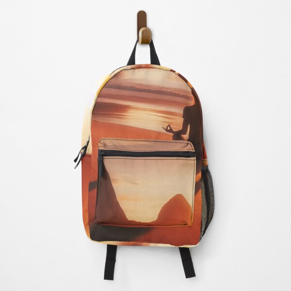 Item preview, A person meditates on a serene beach at sunset, with mountains in the background and a calm sea reflecting the golden light designed and sold by homydesign.