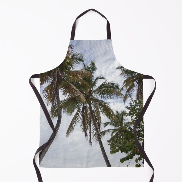 Item preview, A serene beach scene features a cluster of tall palm trees leaning designed and sold by EyezWatchin.