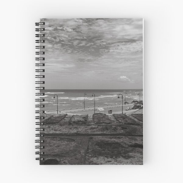 Item preview, Between two brick walls, a coastal scene unfolds with a view of the ocean under a cloudy sky designed and sold by EyezWatchin.