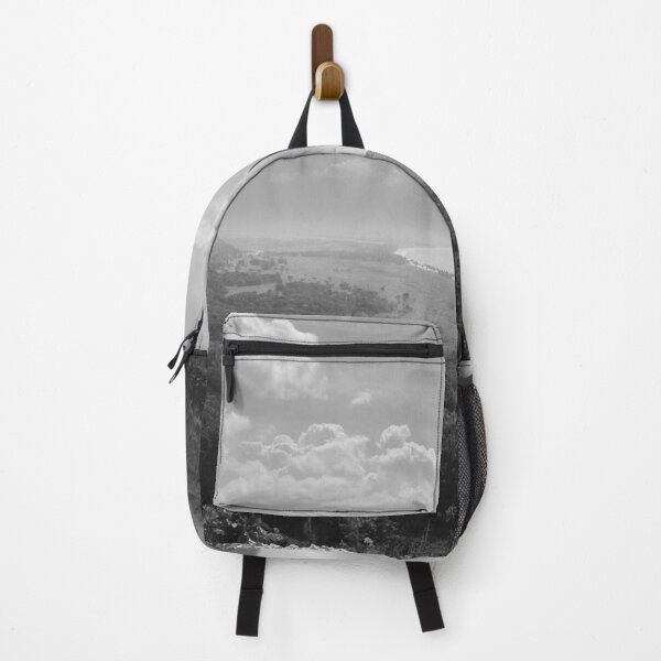 Item preview, A sweeping black and white landscape captures a serene coastline meeting lush forests under a sky filled with dramatic clouds designed and sold by EyezWatchin.