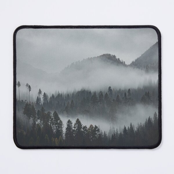 Item preview, A misty forest landscape with tall trees and mountain silhouettes in the background. designed and sold by Piotr Front.