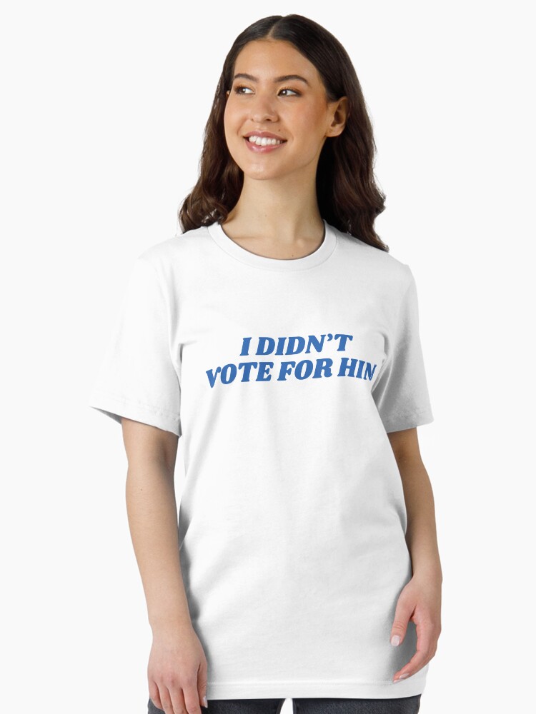 Imagen 2 de 7, Camiseta esencial con la obra Elecciones 2024 anti-Trump No voté por él, diseñada y vendida por yurainahoo.