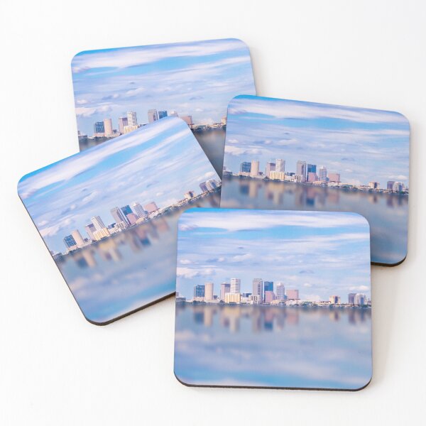 Item preview, Tampa Florida city skyline is beautifully reflected on a calm body of water designed and sold by EyezWatchin.