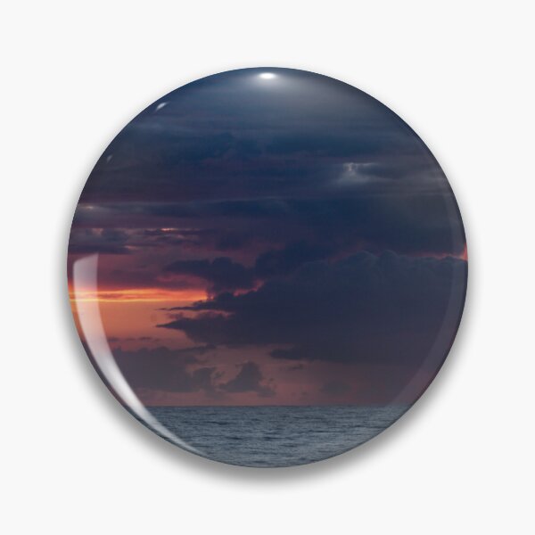 Item preview, Lightening strikes in a dramatic sunrise over the ocean, with dark, swirling clouds designed and sold by EyezWatchin.