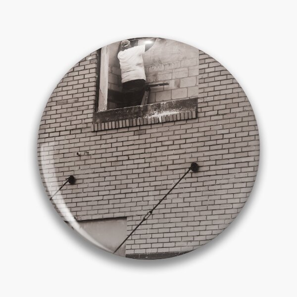 Item preview, A construction worker is working on a wall brick building viewed through an unfinished window designed and sold by EyezWatchin.