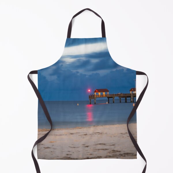 Item preview, A perfect blend of night photography and coastal charm, this image celebrates the allure of Clearwater Beach, its vibrant pier lights, and the tranquil atmosphere of the seaside at dusk designed and sold by EyezWatchin.