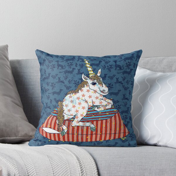 Little unicorn chilling on a pile of pillows Throw Pillow