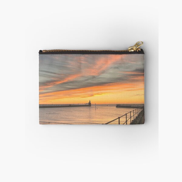 Item preview, Sunrise over the piers at Blyth in Northumberland. designed and sold by Violaman.