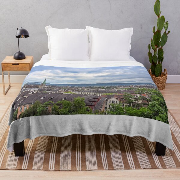 Item preview, Church towers and buildings in old town Zurich skyline, cloudy morning designed and sold by goceris.