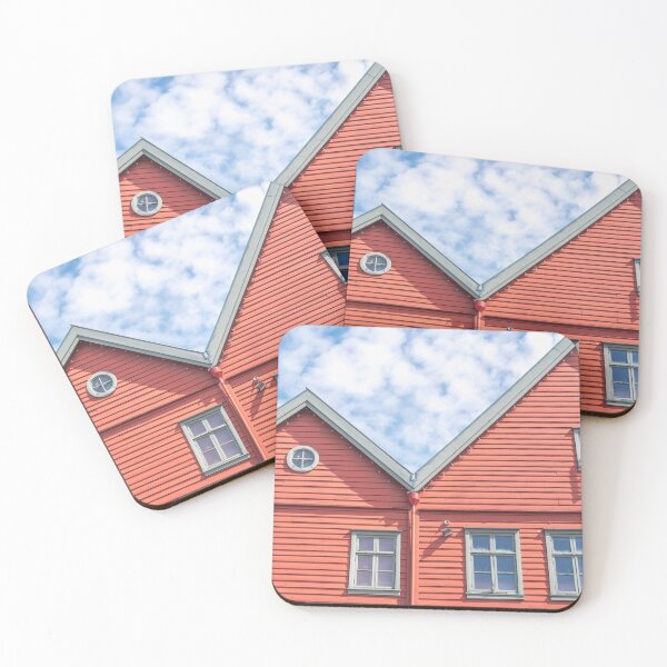 Item preview, Two world heritage houses in Bryggen in Bergen, Norway in red with a blue cloudy sky - summer street and travel photography designed and sold by Christa Stroo Photography.
