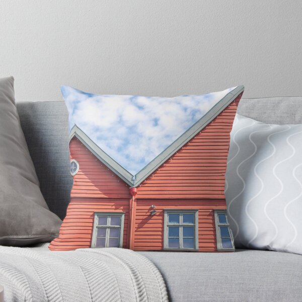 Item preview, Two world heritage houses in Bryggen in Bergen, Norway in red with a blue cloudy sky - summer street and travel photography designed and sold by Christa Stroo Photography.