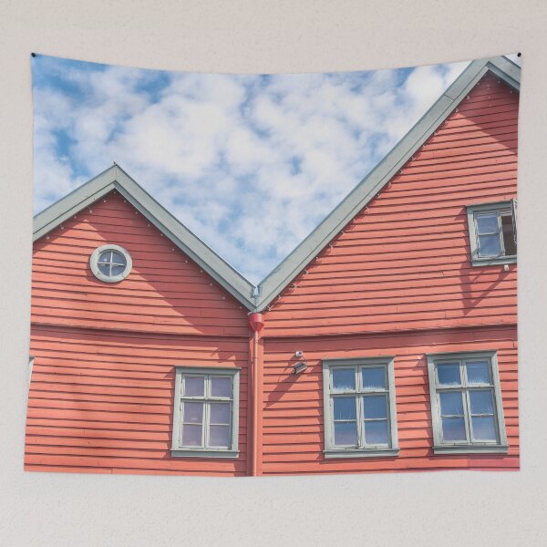 Item preview, Two world heritage houses in Bryggen in Bergen, Norway in red with a blue cloudy sky - summer street and travel photography designed and sold by Christa Stroo Photography.