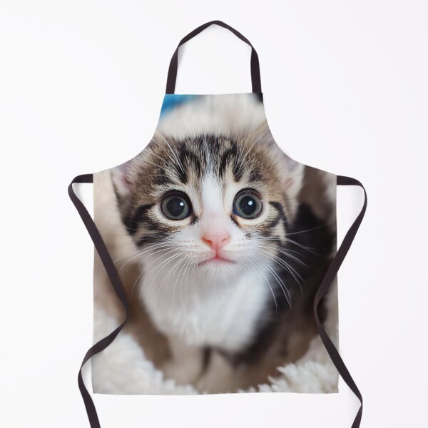 Item preview, Bright-Eyed Wonder: A Fluffy Kitten's Curious Gaze Wrapped in Cozy Warmth designed and sold by exitbird.