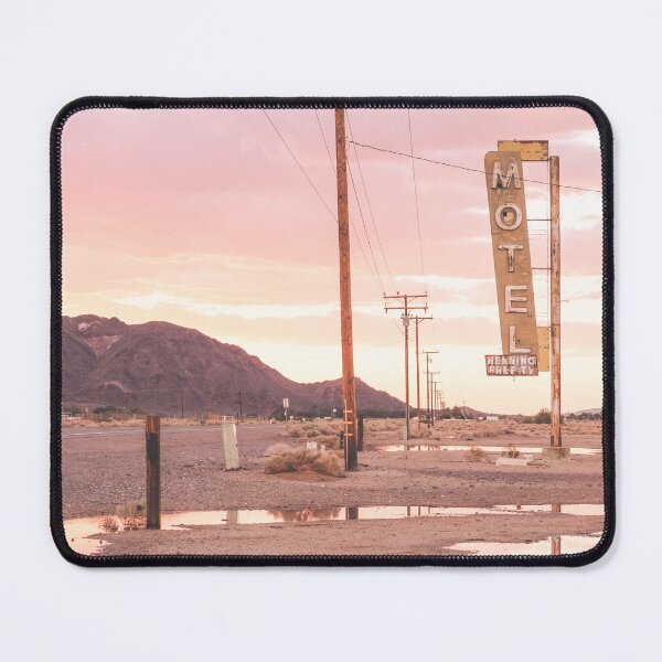 Item preview, Route 66, USA I Sunset in front of a vintage retro motel neon sign in a California desert landscape to pastel pink sky sun aesthetic and a mirrored reflection in water in front of the Bagdad Cafe designed and sold by Julie Travel Photography.