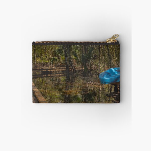 Item preview, Lettuce Lake Park Tampa Florida Blue Canoe Reflection blue kayak rests on a wooden dock surrounded by a lush forest designed and sold by EyezWatchin.