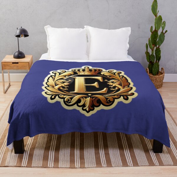 Item preview, un lujoso emblema chapado en oro con una prominente letra "E" en el centro Pegatina designed and sold by ShihawyAhmad.