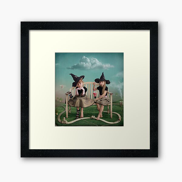 Young sorceress Framed Art Print