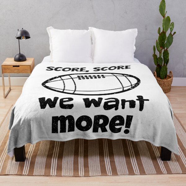 Item preview, Score score we want more, a vintage football call to action in black and white, with dynamic slogans driving passion, achievement, and relentless pursuit of victory on the field. designed and sold by SplashTastic.