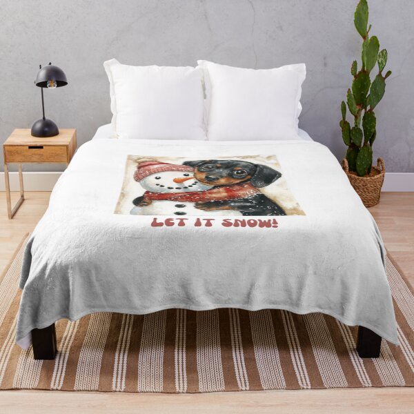 Item preview, Dachshund dog playing with snowman let it snow designed and sold by M1234s.