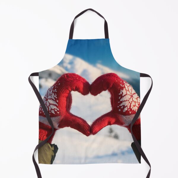 Item preview, Hands in red mittens forming a heart shape in the snow designed and sold by homydesign.