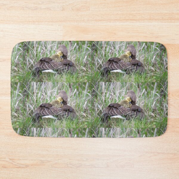 Item preview, Greylag goose snuggles up to its mother in the rain designed and sold by Ingo Gerlach.