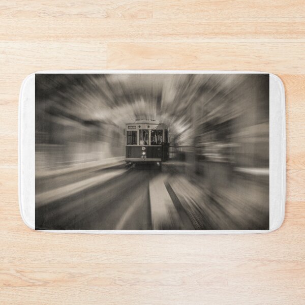 Item preview, A vintage tram moves quickly down the track with a blurred background creating a sense of speed designed and sold by EyezWatchin.