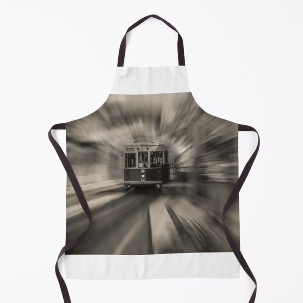 Item preview, A vintage tram moves quickly down the track with a blurred background creating a sense of speed designed and sold by EyezWatchin.