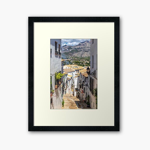 Item preview, View down a narrow street with mountains in the background, Altea, Costa Blanca, Spain designed and sold by Kevin Hellon.