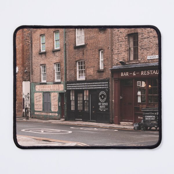 Item preview, London, England I Street with brick architecture facades in Londoner vintage district of Spitafields from a retro UK urban landscape to the dark moody aesthetic of an analog film photography designed and sold by Julie Travel Photography.