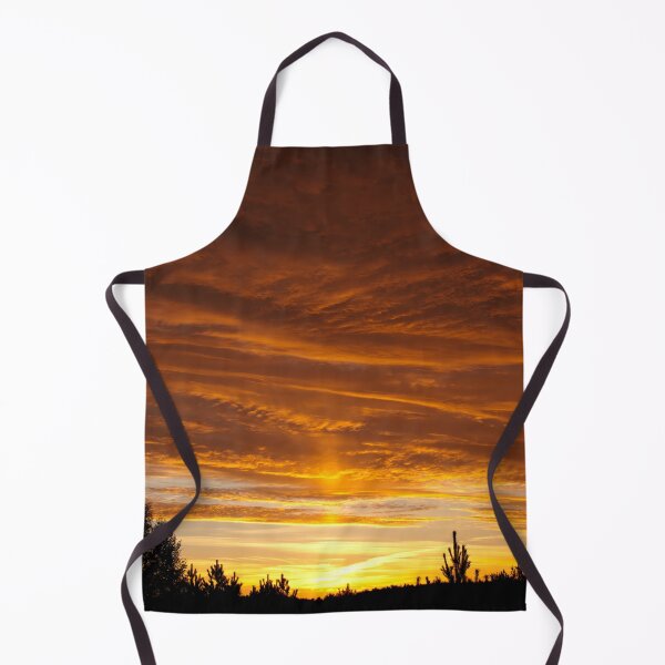 Item preview, Sunset behind trees with warm glowing clouds designed and sold by Piotrek0001.