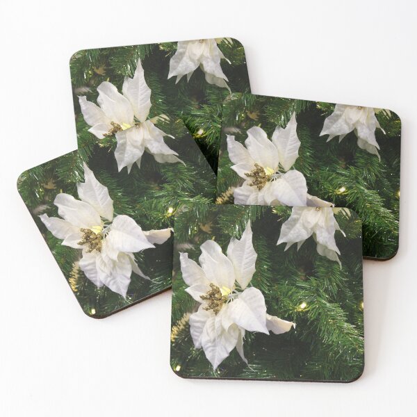 Item preview, White poinsettias adorn a lush green Christmas tree, designed and sold by InezPhotography.