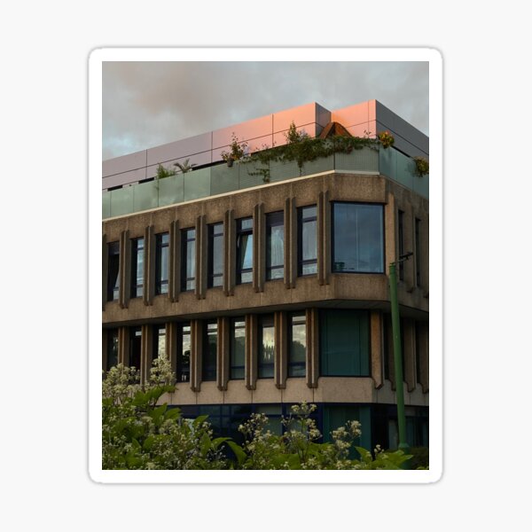 pink light hits angular roof, corner on. blue glass sits snug between concrete pillars with teal roof garden Sticker