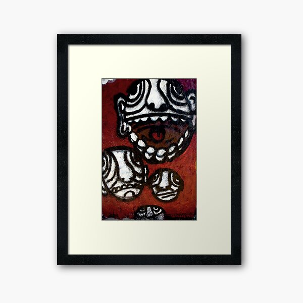 Faces on a Wall Framed Art Print