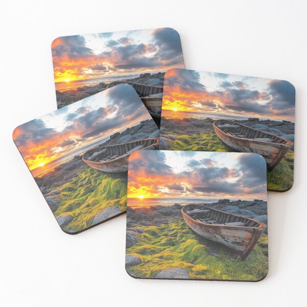 Item preview, An Abandoned boat on rocky beach at sunset - Landscape photo designed and sold by TheArtistOf2022.