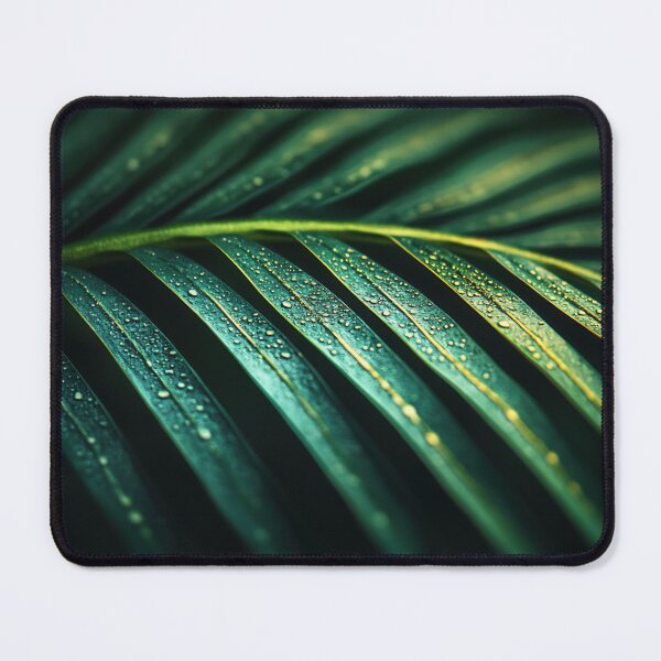 Item preview, Close-up of lush green palm leaf covered in droplets, captured in a vibrant tropical setting after rainfall designed and sold by anytka.
